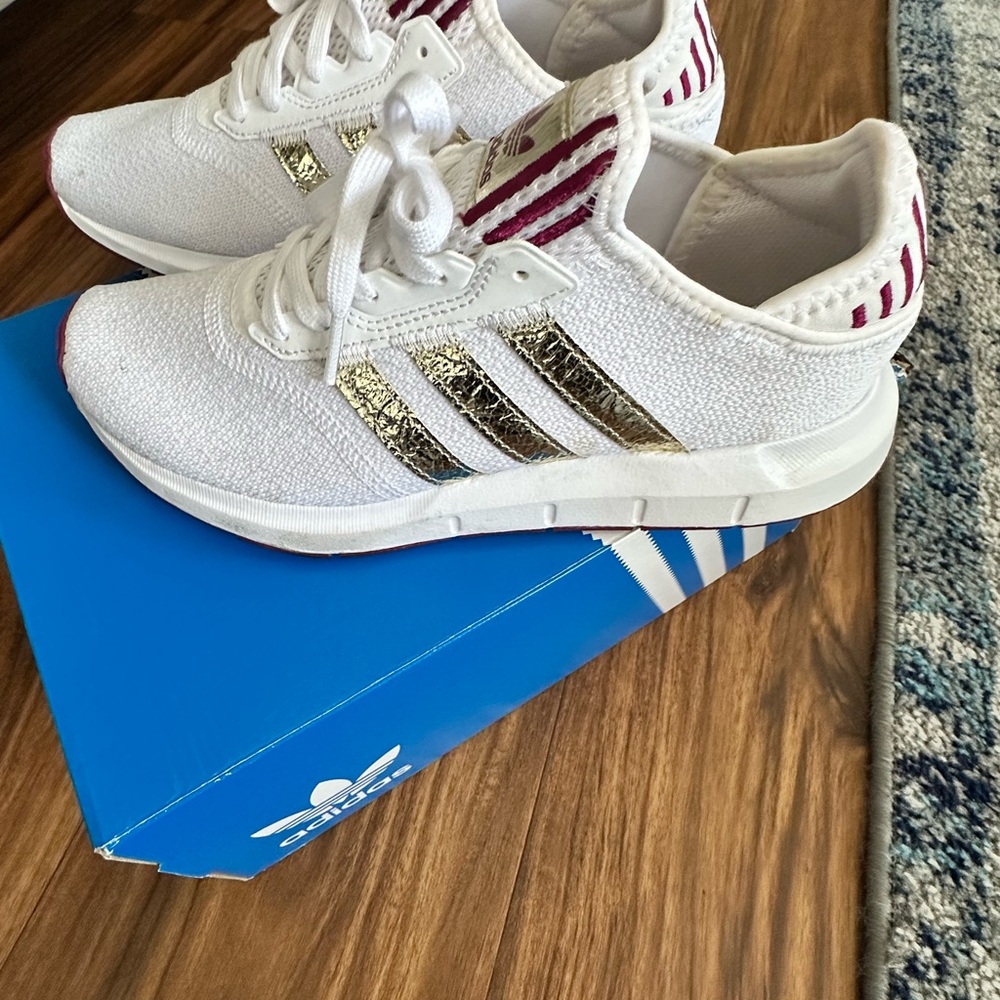 adidas White Sneakers with Gold Stripes and Burgundy Accents